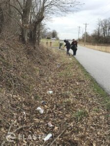 Cleaning up plastic pollution on the roadside